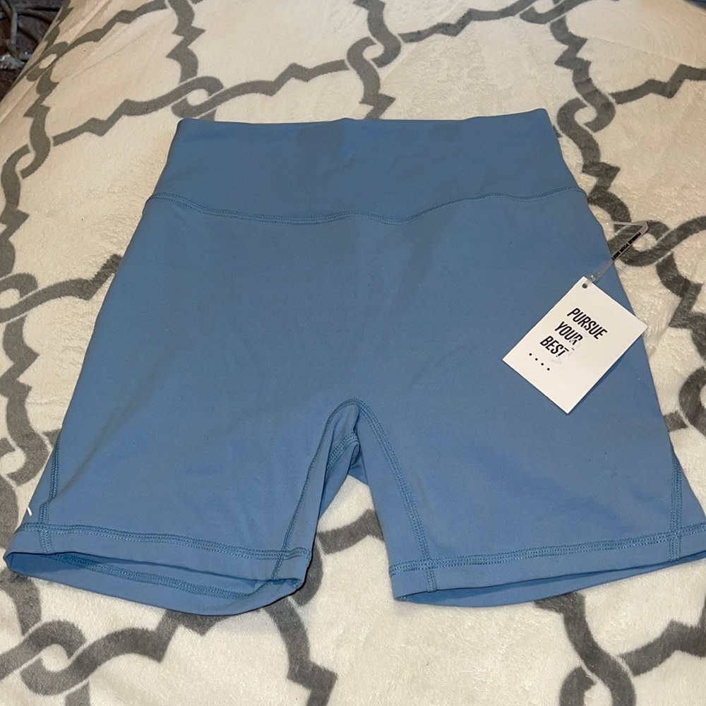 Light blue biker shorts but not as long
